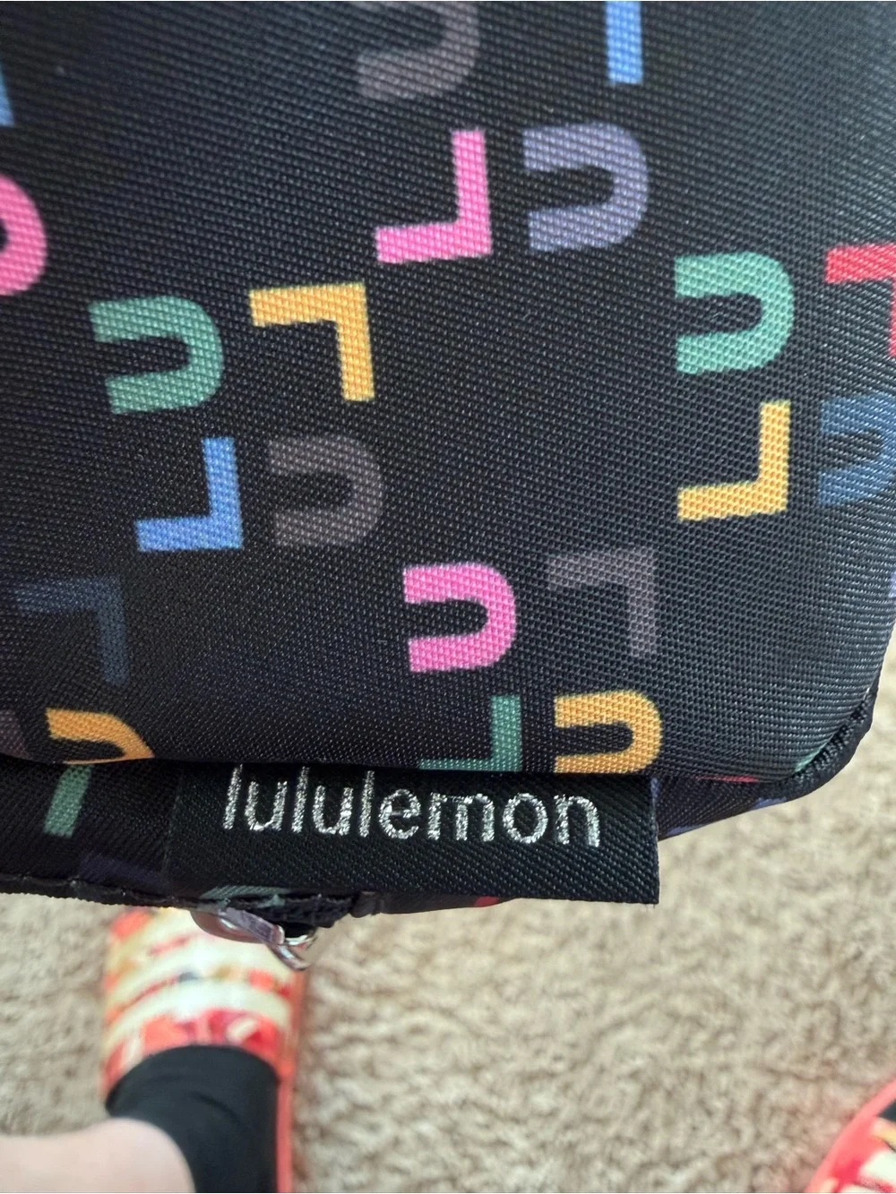 lululemon athletica Black belt bag with Multicolor with spell out Print